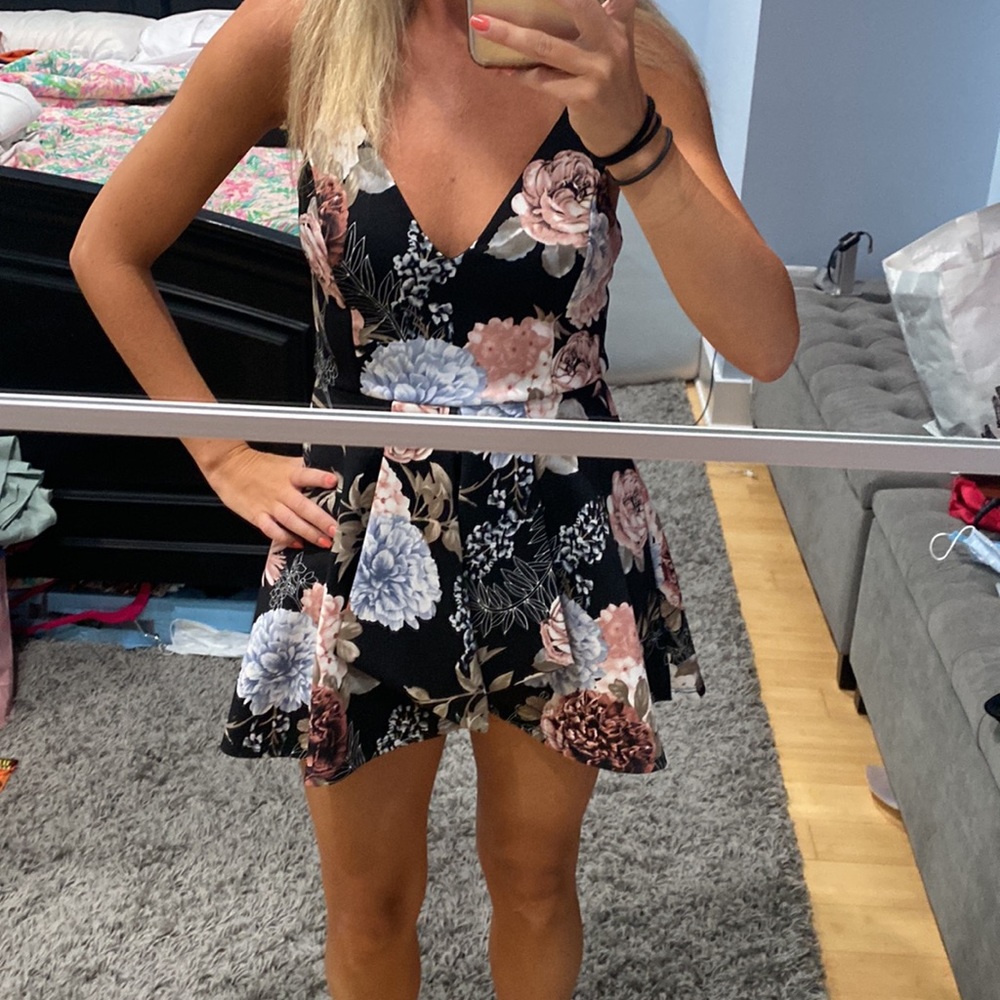 Floral romper that looks like a skirt from front and back